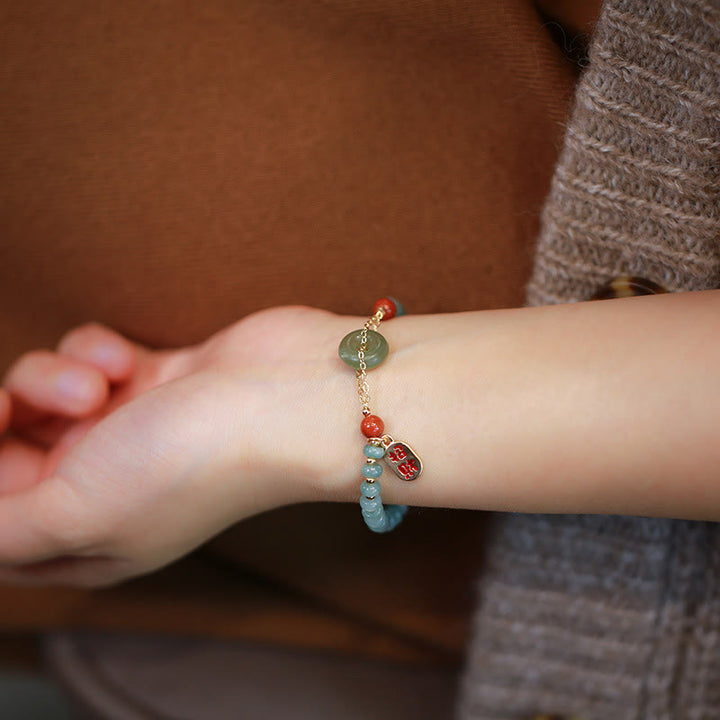 Bracelet porte-bonheur en Buddha Stones naturel Hetian et agate rouge avec boucle de paix