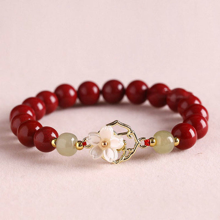 Bracelet de bénédiction en pierre de cinabre naturelle et jade Tridacna avec Buddha Stones