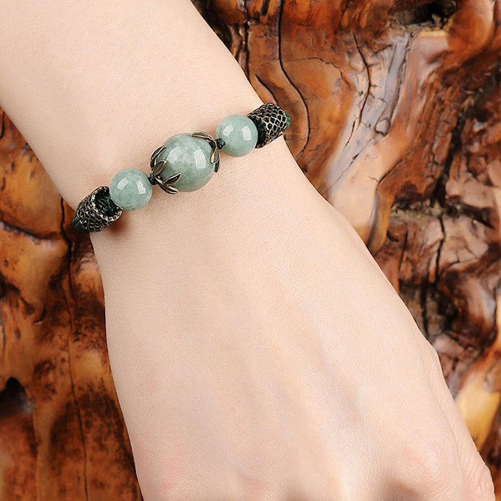 Bracelet de prospérité en perles de jade et corde verte fait main avec Buddha Stones