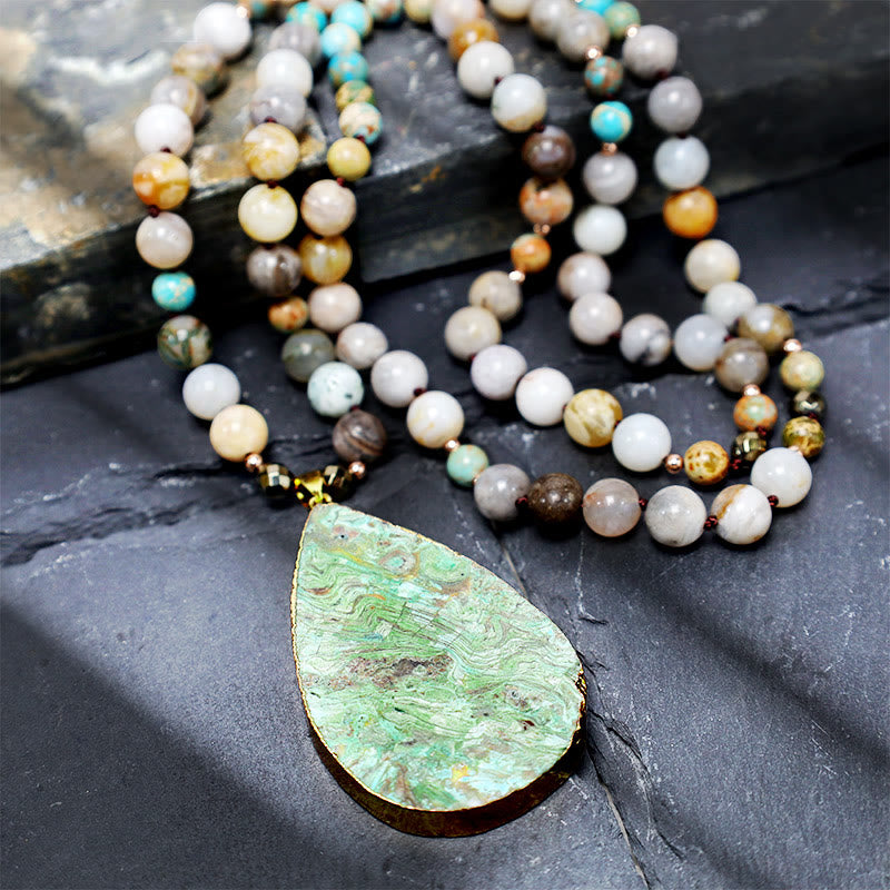 Collier de guérison en perles de jaspe Picasso naturel de l'océan Buddha Stones