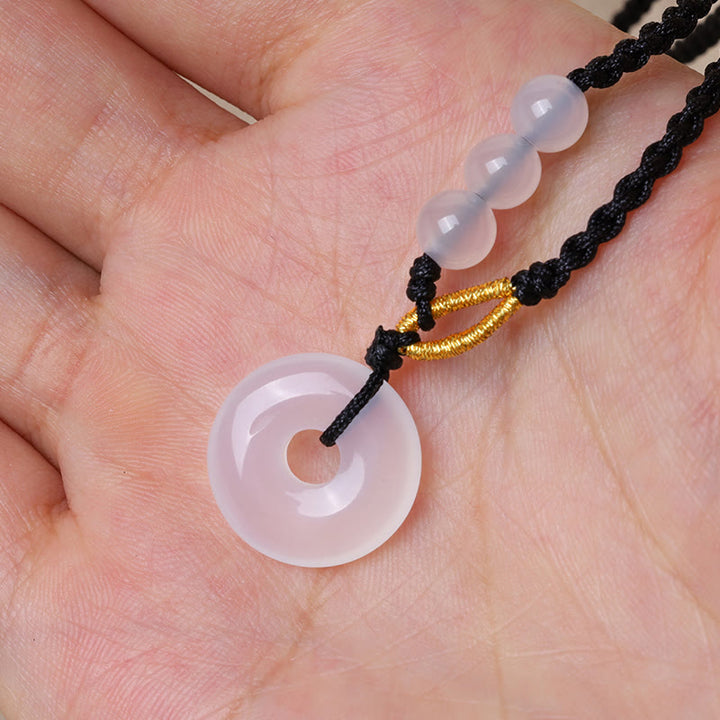Collier pendentif de guérison avec boucle de paix en quartz fraise et calcédoine de Buddha Stones