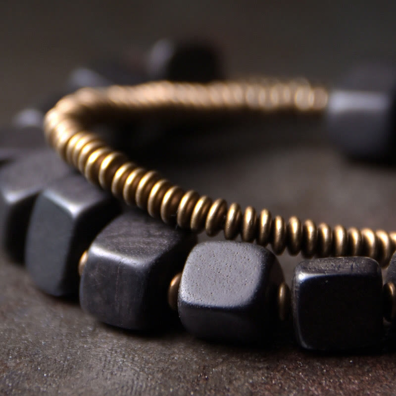 Bracelet double tour en cuivre et bois d'ébène tibétain avec Buddha Stones