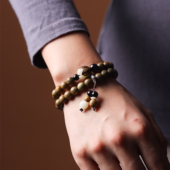 Bracelet double tour apaisant en bois de santal vert et graines de lotus Buddha Stones