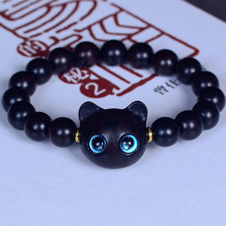 Bracelet Buddha Stones Bois d'ébène Verre Liuli Joli Chat Paix Équilibre - Perles en ébène 10 mm x 15 (tour de poignet 14-16 cm) - image 10