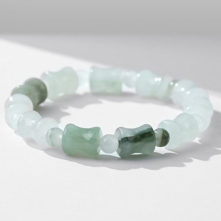 Bracelet porte-bonheur en jade et coquille de noix de coco Buddha Stones et motif bambou