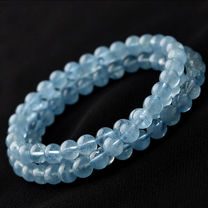 Bracelet de guérison de la paix en aigue-marine naturelle de Buddha Stones