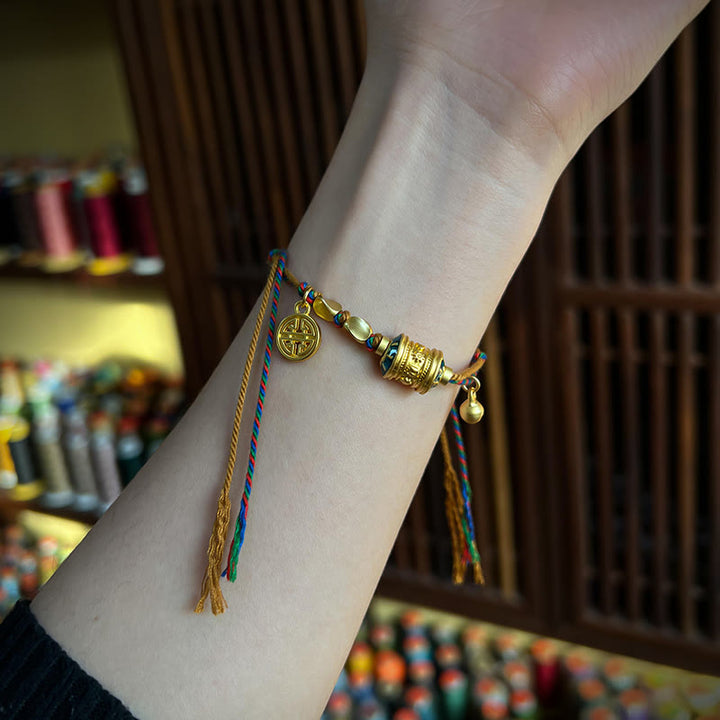 Bracelet tibétain en Buddha Stones fait à la main avec roue de prière Om Mani Padme Hum et cordon de protection