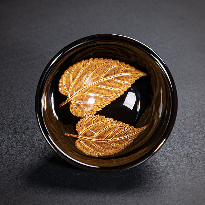 Tasse à thé en céramique chinoise Jianzhan avec feuilles d'érable dorées et Buddha Stones