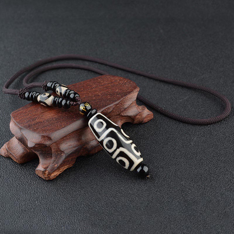 Collier de protection de richesse en perles Dzi à neuf yeux de Buddha Stones