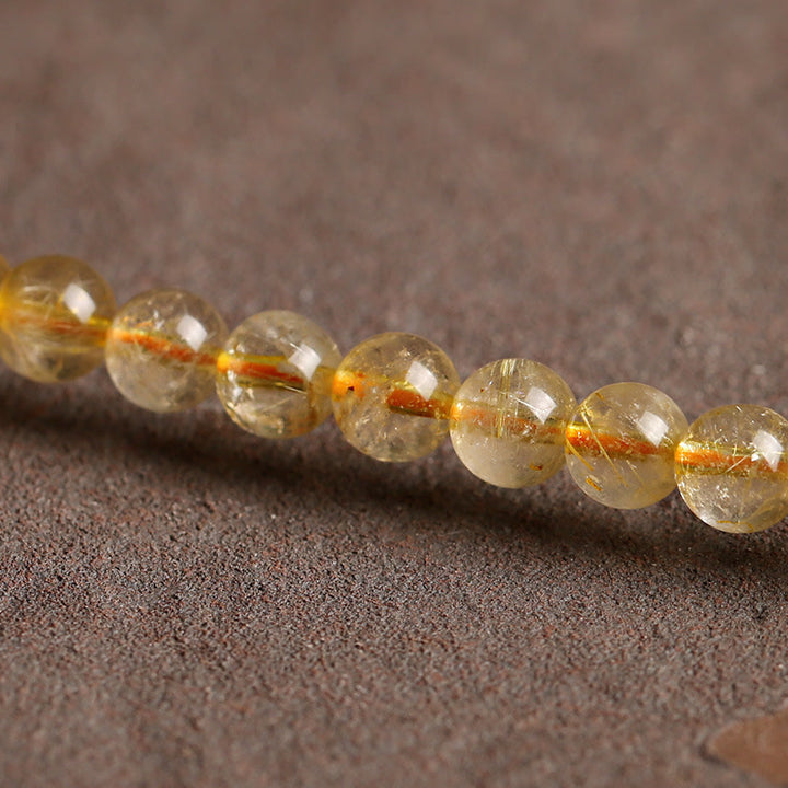 Bracelet de protection et de prospérité en Buddha Stones en citrine naturelle