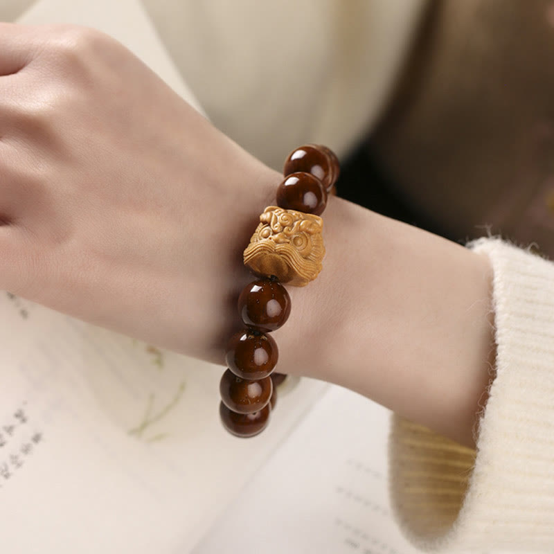 Bracelet de sagesse du lion dansant en Buddha Stones et graines de Bodhi violettes