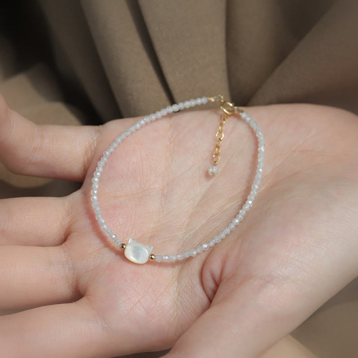 Bracelet de guérison en pierre tridacna avec spinelle noire et cristal blanc plaqué or 14 carats de Buddha Stones - image 12