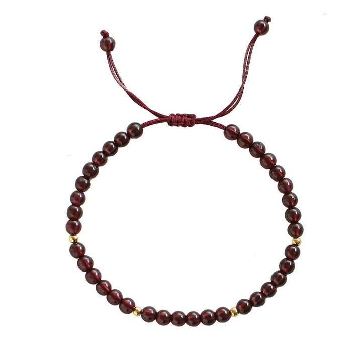 Bracelet de stabilité en perles dorées et grenat naturel avec Buddha Stones