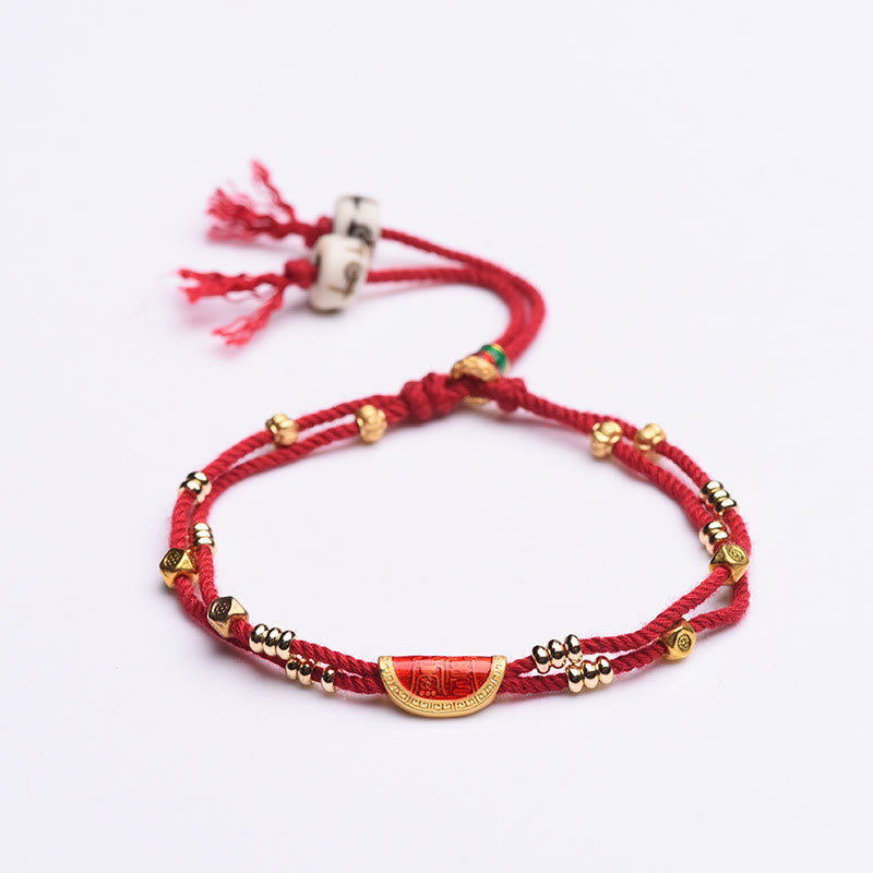 Bracelet en corde rouge tressée porte-bonheur en forme de boulettes de cinabre faites à la main par Buddha Stones