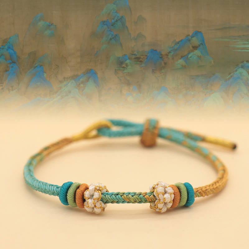 Bracelet tressé fait main en corde porte-bonheur avec nœud de paix à huit fils et nœud de fleur de pêcher en Buddha Stones - Panorama de rivières et de montagnes (vert jaune) (tour de poignet 14-18 cm) - image 1