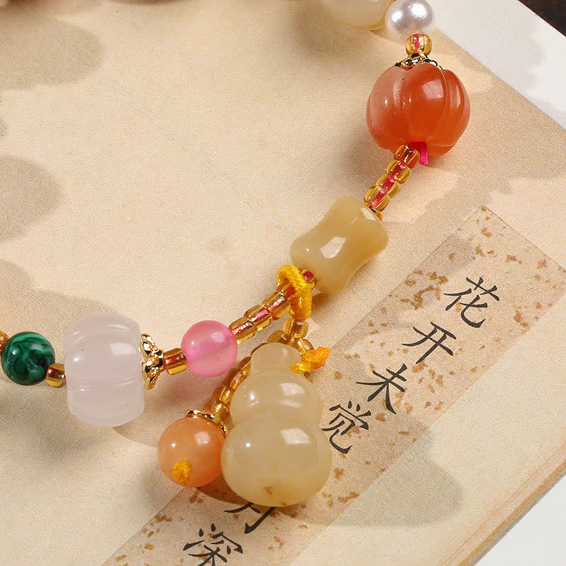 Bracelet à breloques en perles de citrouille Pixiu en soie dorée naturelle et cristaux de jade