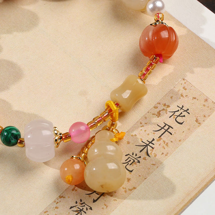 Bracelet à breloques en perles de citrouille Pixiu en soie dorée naturelle et cristaux de jade