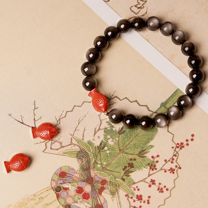 Bracelet de protection apaisante en obsidienne et cinabre avec Buddha Stones et reflets argentés naturels