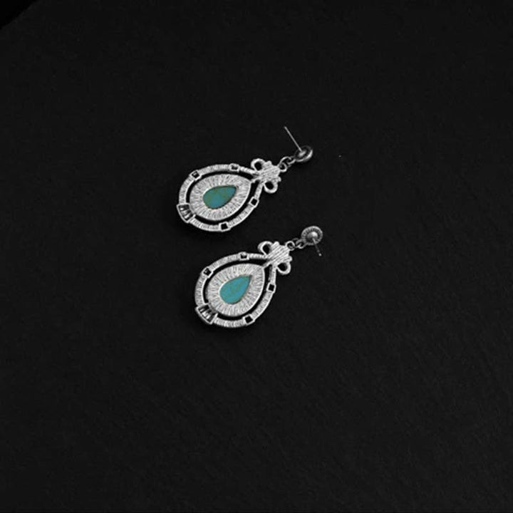 Boucles d'oreilles pendantes en forme de goutte d'eau turquoise vintage du Tibet