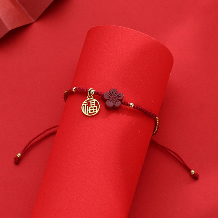 Bracelet tressé Buddha Stones et fleur de cinabre, bénédiction du personnage Fu