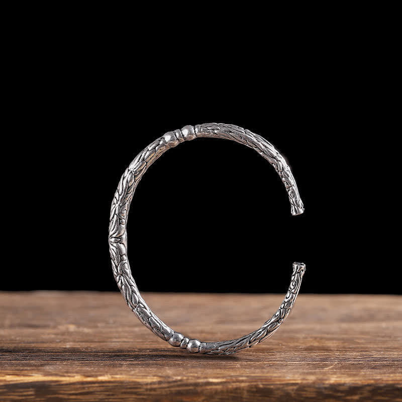 Bracelet manchette d'équilibre gravé à motif de dragon fleuri