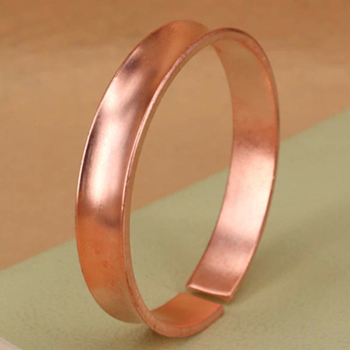 Bracelet manchette porte-bonheur en cuivre