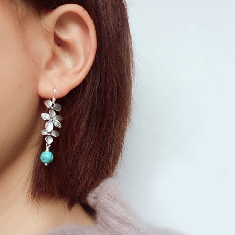 Boucles d'oreilles pendantes en argent sterling 925 avec Buddha Stones , turquoise, lazurite et lapis-lazuli, motif fleur et feuille, symbole de sérénité et de protection. - image 1