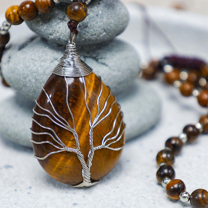 Collier avec pendentif en perles de force en œil de tigre naturel et Buddha Stones