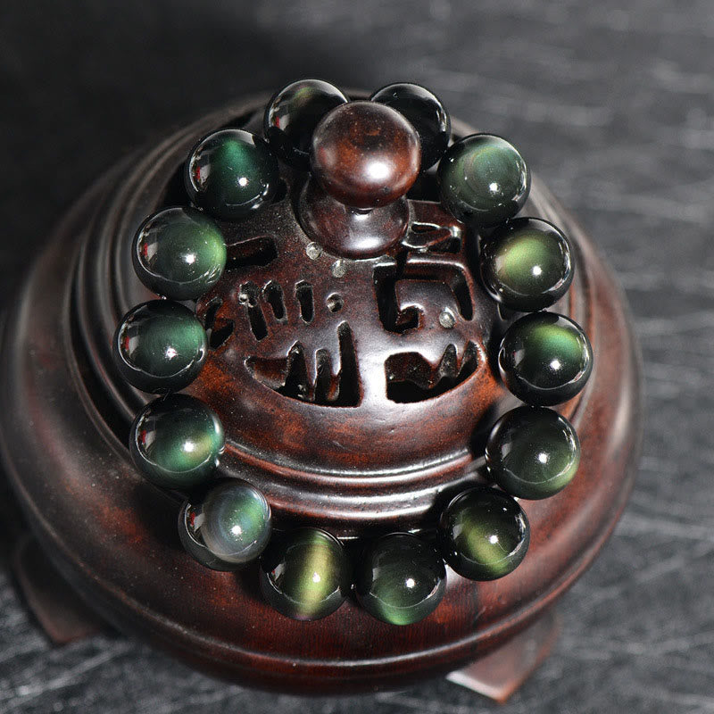 Bracelet de richesse en obsidienne naturelle œil vert Buddha Stones