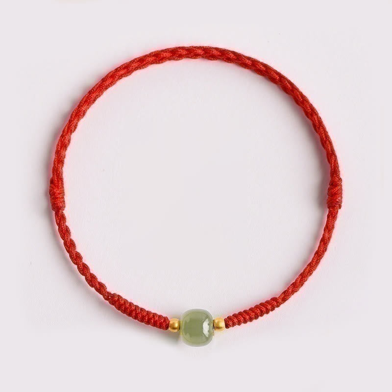Bracelet tressé en perles de jade porte-bonheur et prospérité fait main avec Buddha Stones