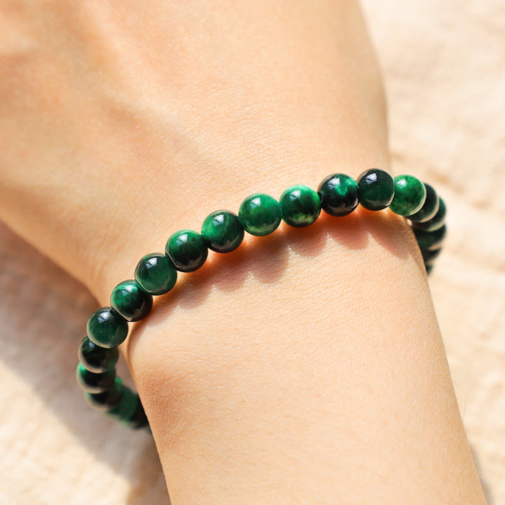 Bracelet énergétique de guérison et de croissance en œil de tigre Buddha Stones