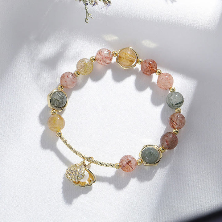 Bracelet de perles de protection en coquillage de quartz rutile coloré naturel de Buddha Stones