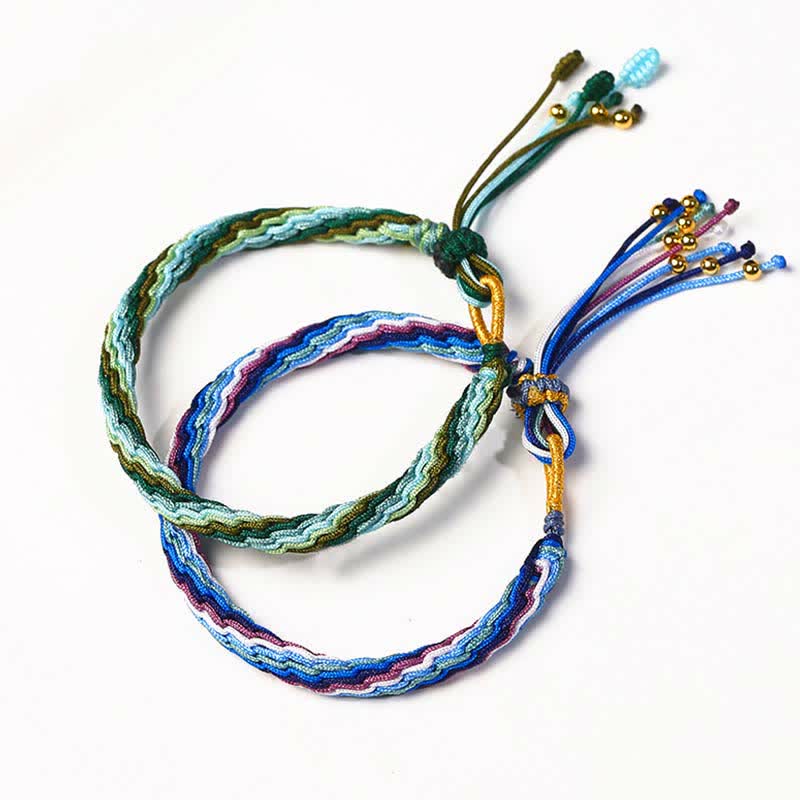 Bracelet tressé de protection avec cordon porte-bonheur et nœud de réincarnation