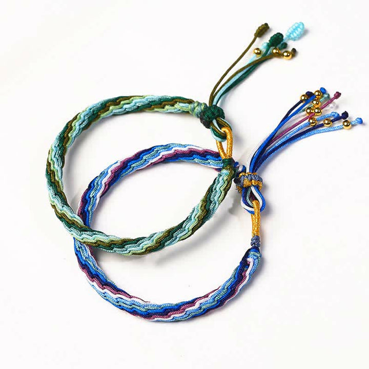 Bracelet tressé de protection avec cordon porte-bonheur et nœud de réincarnation