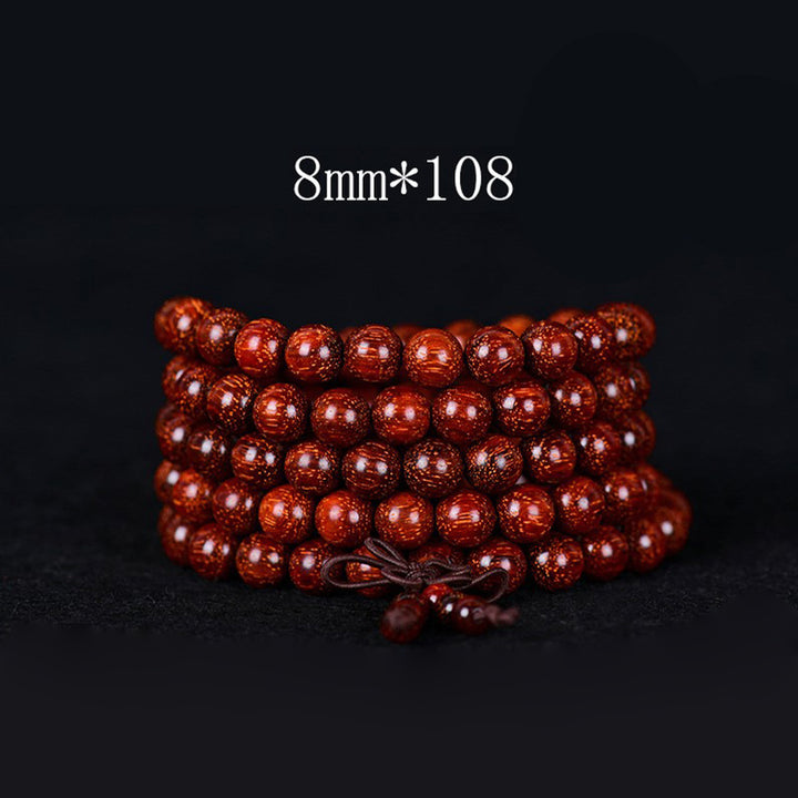 Bracelet d'équilibre tibétain en petites feuilles de santal rouge avec Buddha Stones