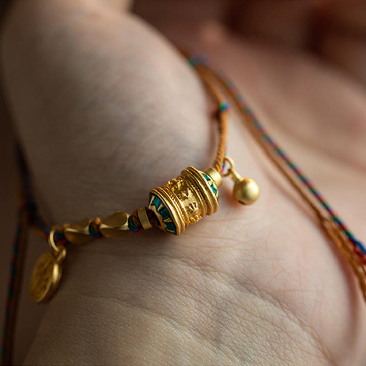 Bracelet tibétain en Buddha Stones fait à la main avec roue de prière Om Mani Padme Hum et cordon de protection