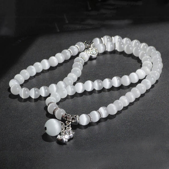 Bracelet triple tour de soutien PiXiu œil de chat en Buddha Stones