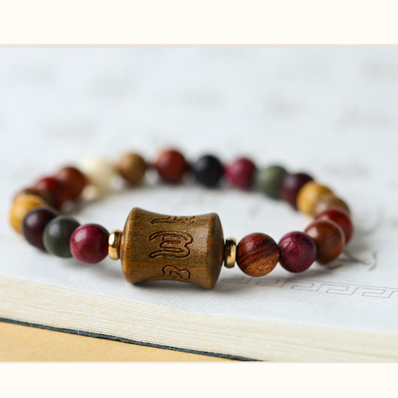 Bracelet de protection Om Mani Padme Hum en bois de santal multicolore du Tibet