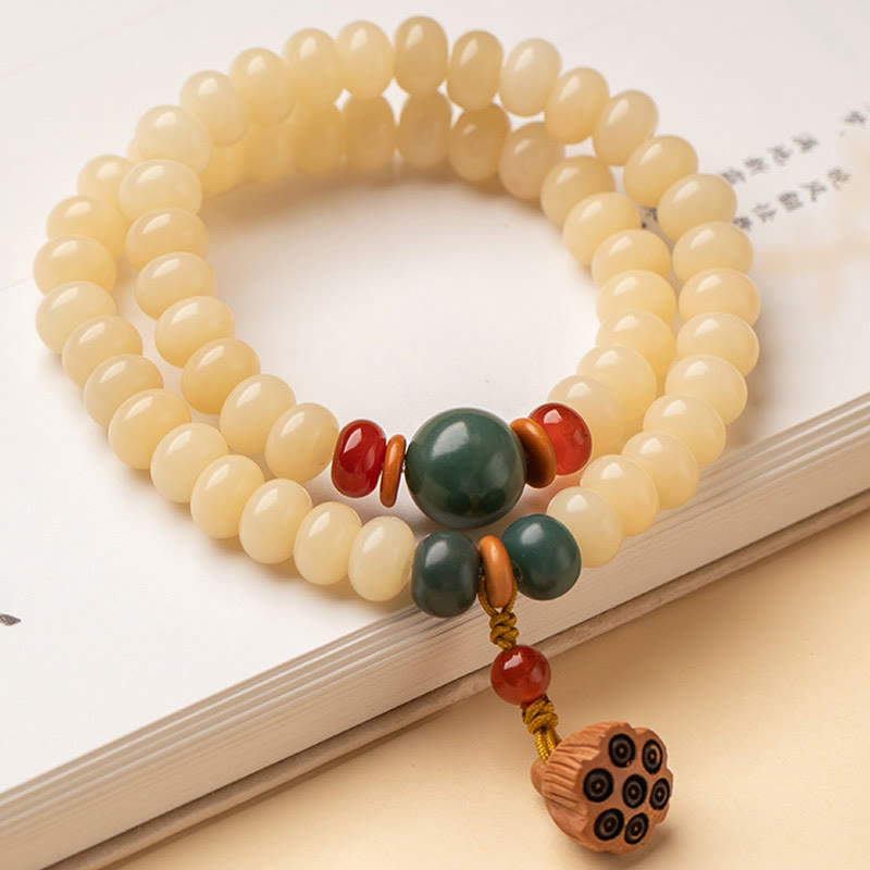 Bracelet double tour avec breloque en forme de gousse de lotus et graines de Bodhi et Buddha Stones
