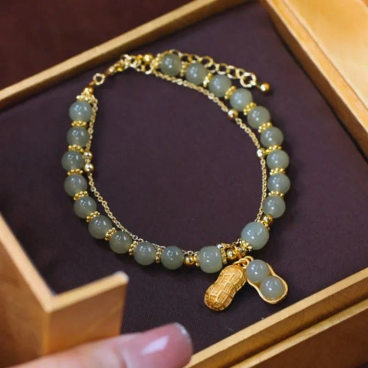 Bracelet de perles porte-bonheur en Buddha Stones, feuille de jade, ginkgo, tulipe, arachide, personnage Fu