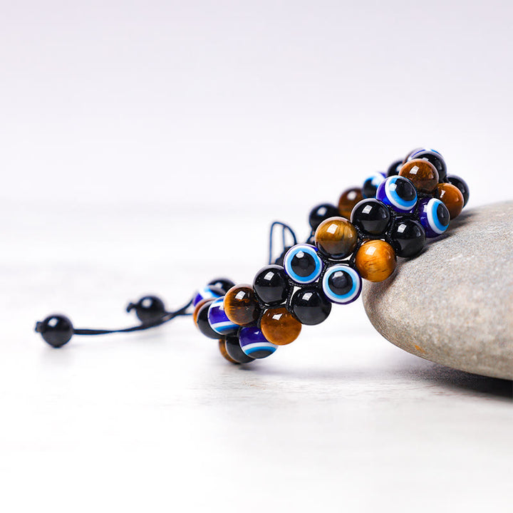 Bracelet de perles de protection contre le mauvais œil en hématite et œil de tigre Buddha Stones