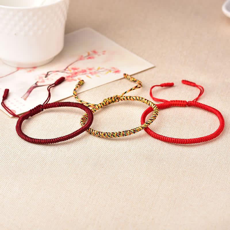 Bracelet tibétain porte-bonheur avec 3 Buddha Stones et cordon rouge