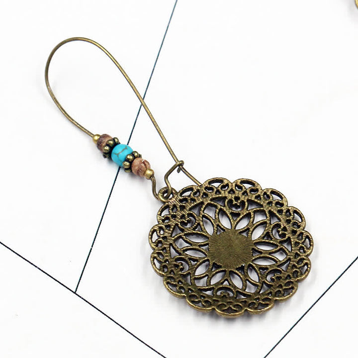 Boucles d'oreilles pendantes porte-bonheur à motif de fleurs rondes