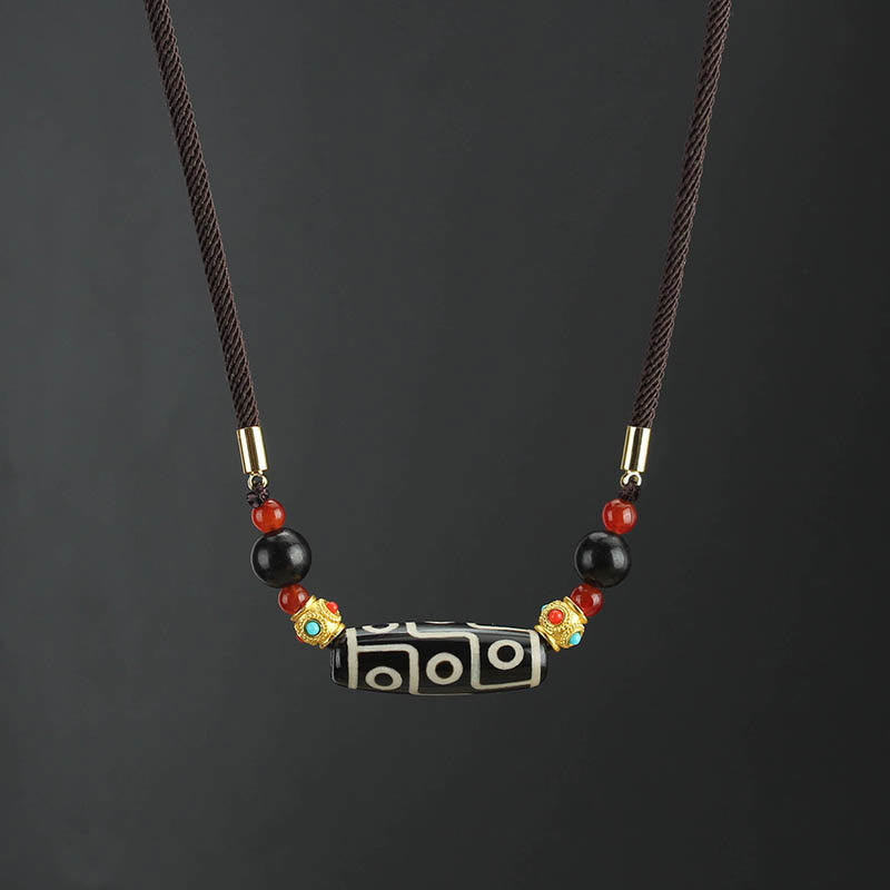 Collier pendentif en corde avec Buddha Stones - Perle Dzi à neuf yeux noire et blanche - image 0