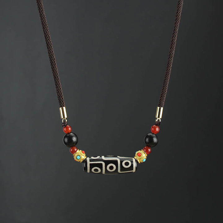 Collier pendentif en corde avec Buddha Stones - Perle Dzi à neuf yeux noire et blanche - image 0