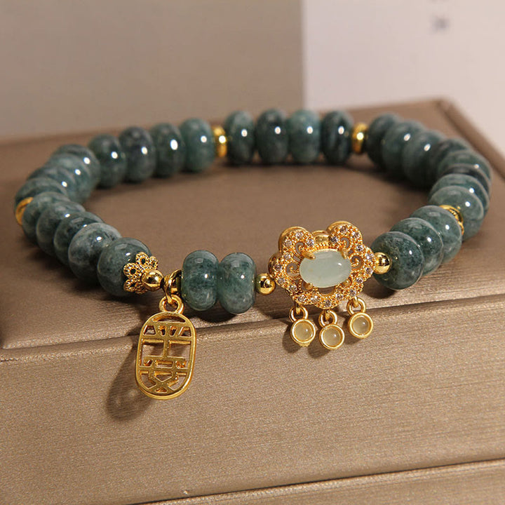 Bracelet en Buddha Stones en jade naturel avec breloque en forme de cadenas chinois, paix, chance et abondance