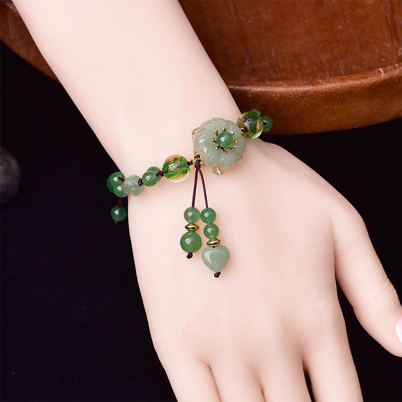 Bracelet porte-bonheur en jade vert naturel Buddha Stones et fleur pendante