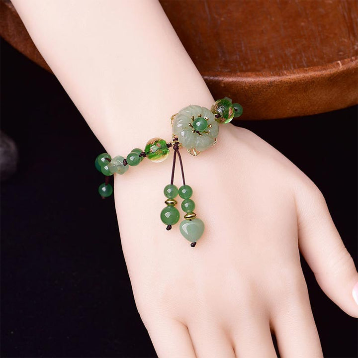 Bracelet porte-bonheur en jade vert naturel Buddha Stones et fleur pendante