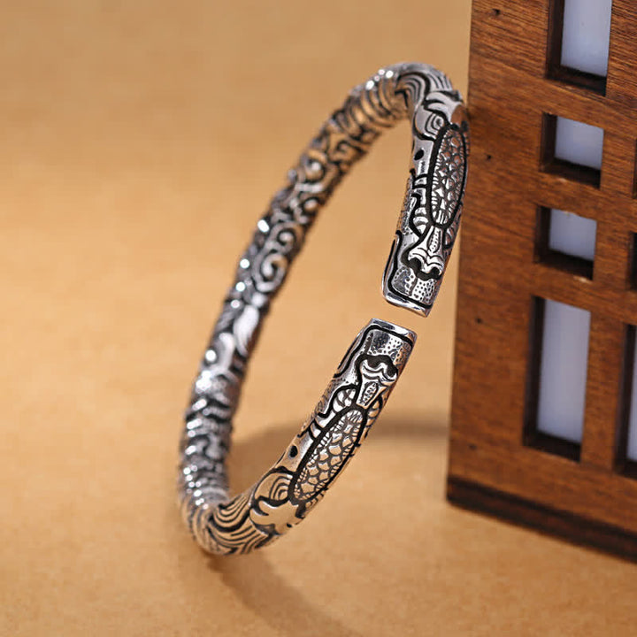 Bracelet porte-bonheur sculpté en forme de tête de dragon