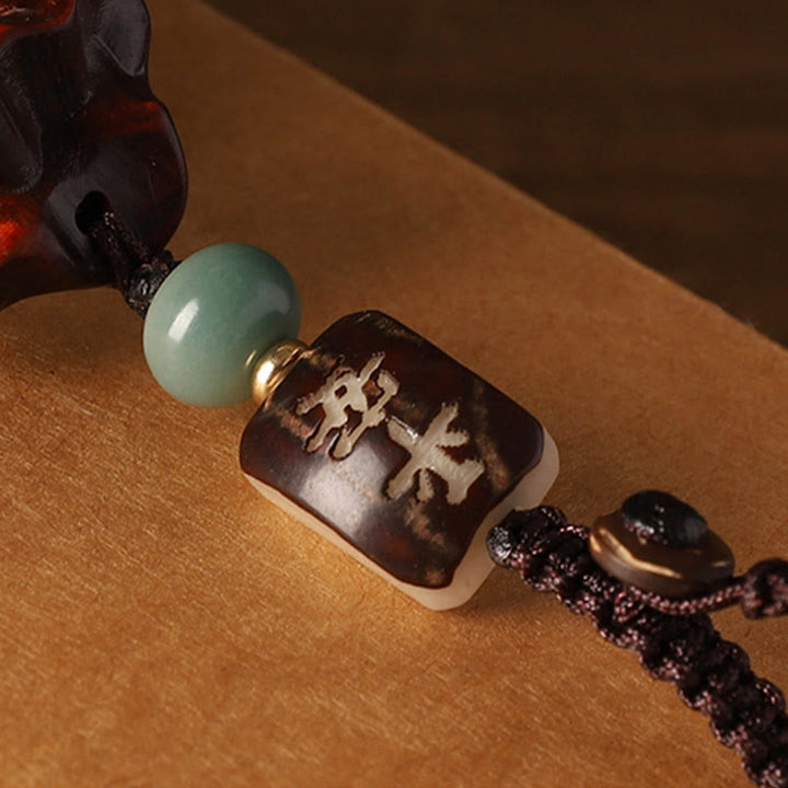 Buddha Stones Petite Feuille Bois de Santal Rouge Bois de Santal Vert Sac d'Argent Om Mani Padme Hum Protection Rotative Décoration Suspendue